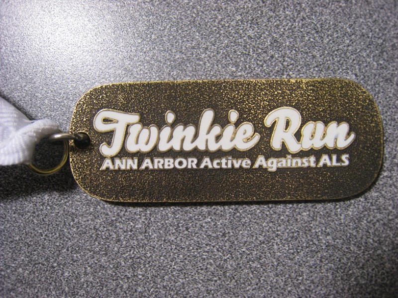 2013 Twinkie 5K 64.JPG - The 2013 Twinkie 5K. This is run on April Fools Day (April 1) every year. It is run in Ann Arbors Gallup Park. This year was a very cold and windy evening. (It is run at 6:15 pm)